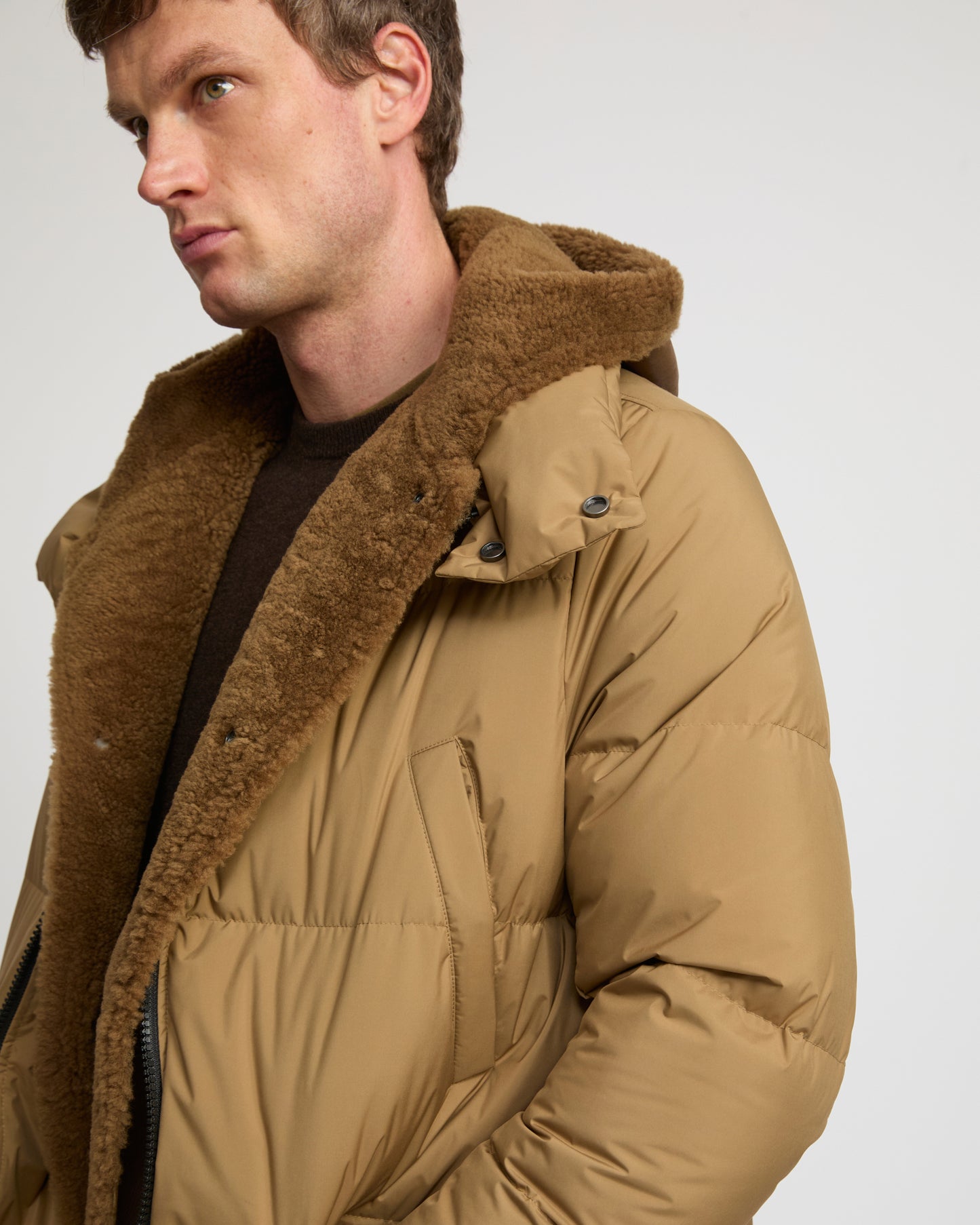 Down jacket with lambskin shearling bib
