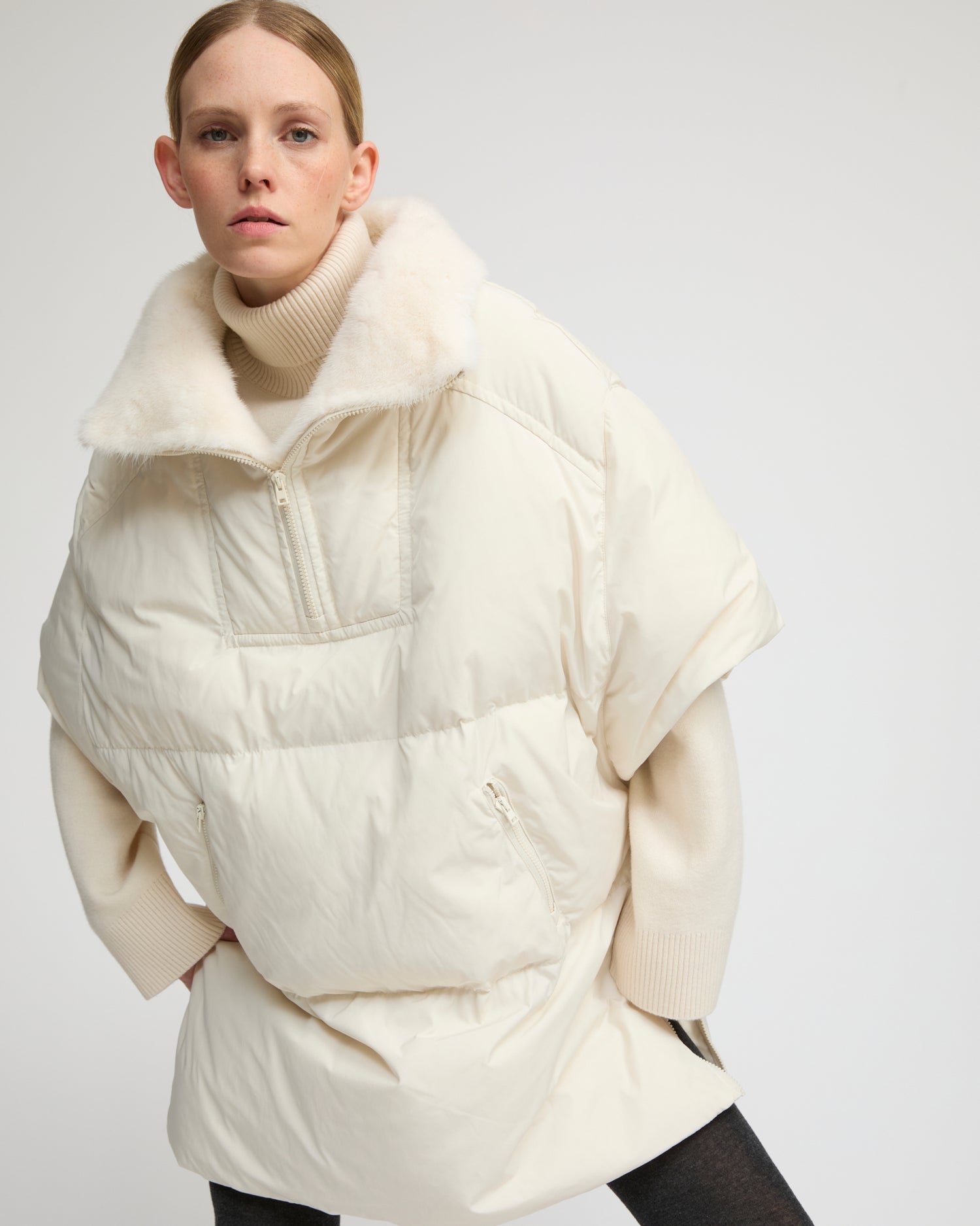 Technical fabric down cape with mink fur stand collar and lining. -Yves Salomon