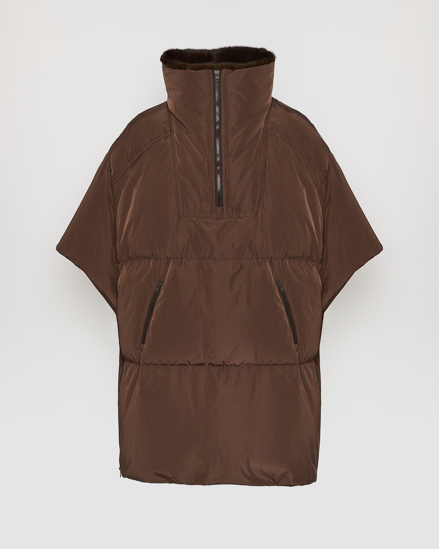 Technical fabric down cape with mink fur stand collar and lining.