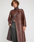 Double-breasted trench coat in bonded leather and wool