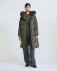Long down jacket in waterproof technical fabric with airy lamb wool trim