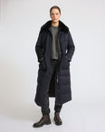 Long down jacket in waterproof wool-blend technical fabric with lambskin shearling trim