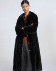 Long reversible coat in water-repellent technical fabric and mink fur