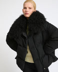 Down jacket in Loro Piana cashmere fabric with long curly lambskin collar