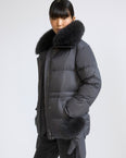 Down jacket in waterproof technical fabric with mittens and fox fur trim