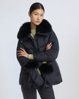 Down jacket in waterproof technical fabric with mittens and fox fur trim