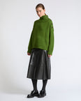 Pleated patent lambskin leather skirt