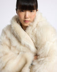 Reversible hooded Toscana lambskin shearling jacket