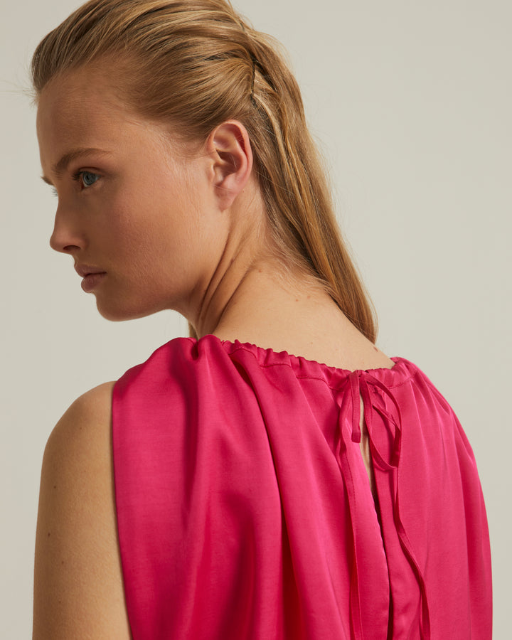 Sleeveless top with adjustable satin neckline